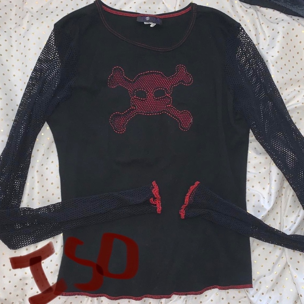 in search of this morbid threads fishnet top